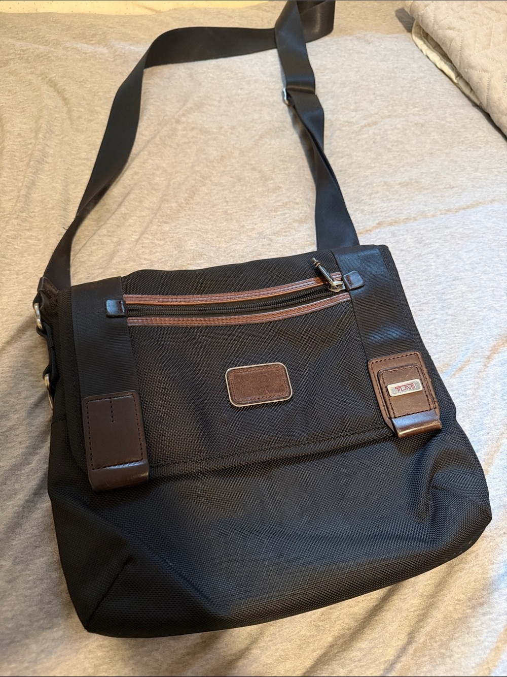 Tumi Black Messenger Bag with Brown Leather Trim